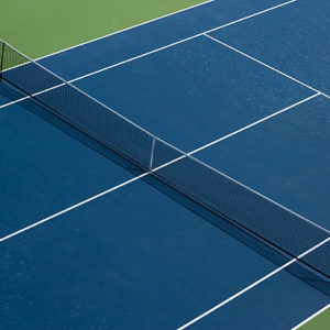 Quel professionnel maîtrise réellement les normes construction court de tennis pour un projet sportif ?